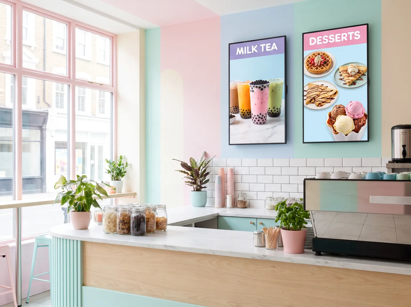 Bubble tea and dessert shop with a bright digital menu board